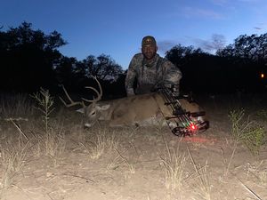 Dagan B. With his Management Buck taken with a Bow.