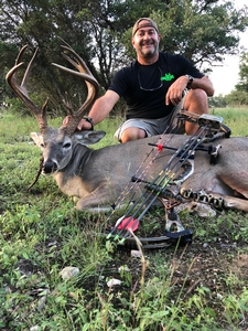 Jim Reagan of Colorado with his 167 Inch 13 point Buck, taken with a bow.