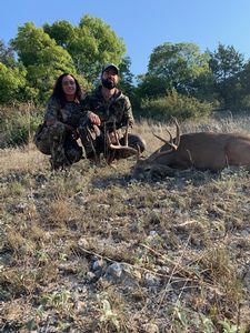 Mckenzie and Art with his buck.