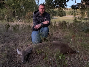 Bobby with his doe taken during the hunt.