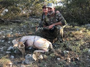 Heather and Cody after a successful bow hunt for a fallow doe.