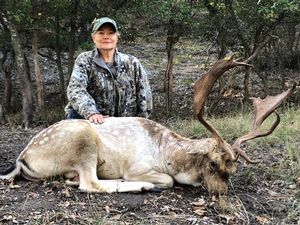 Judy S. with her Fallow Buck.