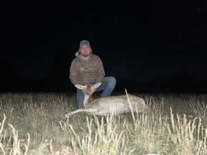 Coleman with his fallow doe.