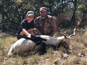 Easton Celebrating his Fallow buck with his Dad Jesse.