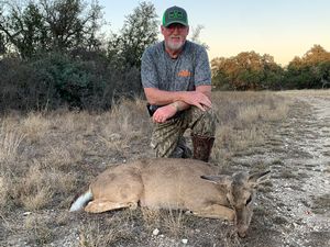 Randy W. with his first whitetail doe of the trip.