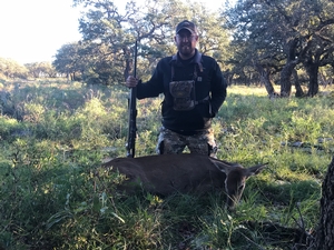 Chris with his 1st whitetail doe.