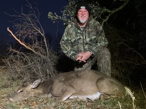 Randy W. with his 1st whitetail doe on the trip.