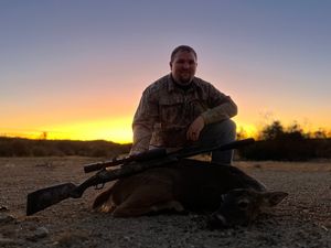 Garrett with his whitetail doe.