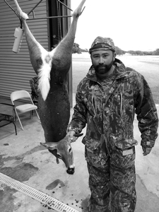 Derick with his whitetail doe.