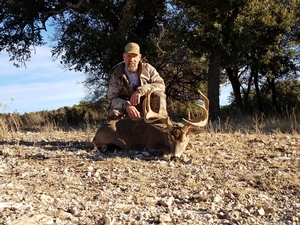 Cody with his 149 inch 11 point Buck. His first Whitetail!