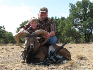 Cody Thomas with his awesome Red Sheep Ram and his son/ assistant guide Crew. Gold SCI Score.