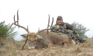 Dustin Vick with his double drop tine 134 inch 10 point taken with a bow.