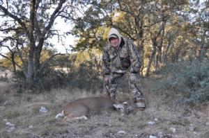 Buck with his second doe of the hunt.