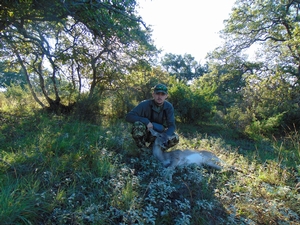 Connor with his whitetail doe.