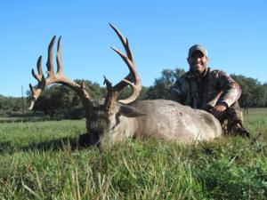 Heavy 170 inch 15pt Trophy buck taken by Evan Lamoreux.