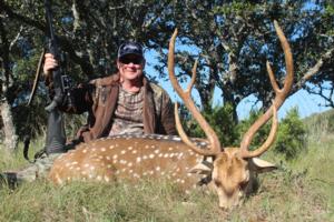 <p>Johnny Downs made a great shot on this Axis buck with huge eye guards.</p>