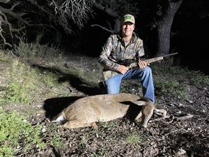 Parker with his whitetail doe.