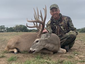 Bernie W. with his 166 Inch 17 point buck!