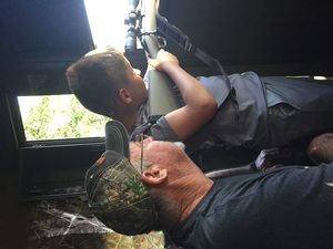 Easton getting ready to take a shot at his first buck!